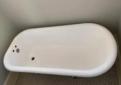 Bathtub after reglazing with smooth, glossy, and like-new surface