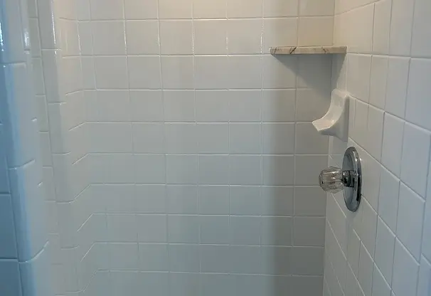 After tile refinishing showing restored shine and smooth surface