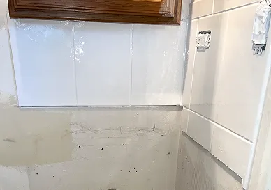 Restored bathroom tiles after reglazing with smooth and spotless finish
