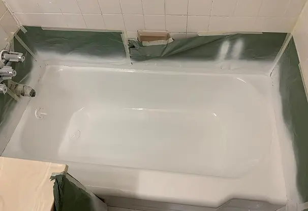 After comparison of sink reglazing showing flawless transformation