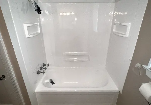 Refinished bathtub  in  Milton, GA– bright white glossy finish after professional restoration