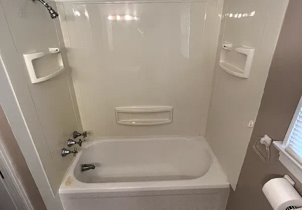 Old bathtub before refinishing in Milton , GA– stained and dull surface before restoration