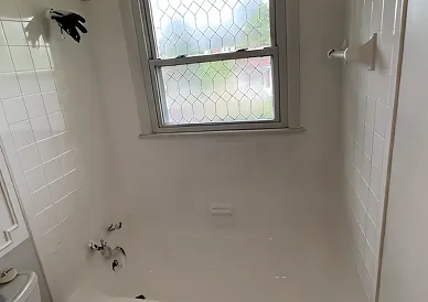 Refinished wall tiles after reglazing with smooth clean look