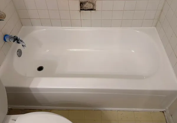 Expert bathtub reglazing completed with a seamless white finish