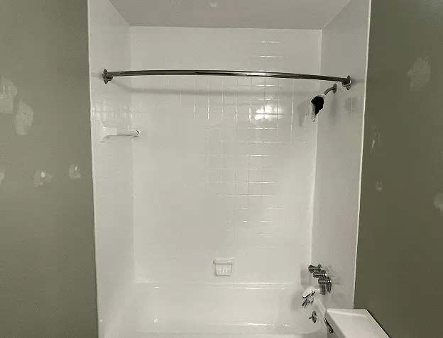 After comparison of sink reglazing showing flawless transformation