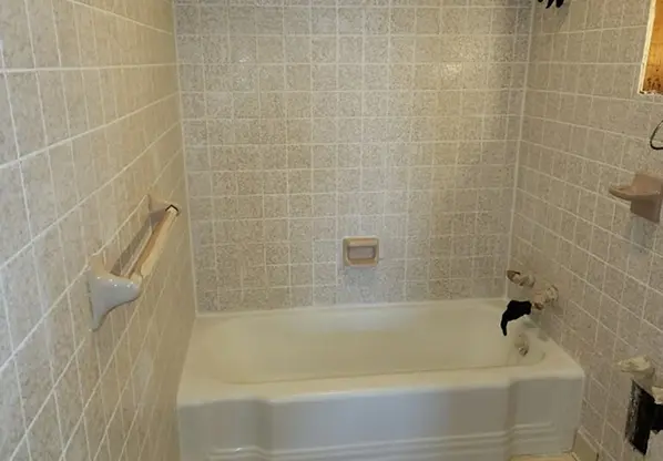 Old tile before reglazing in Milton, GA  – chipped, stained, and dull surface before restoration